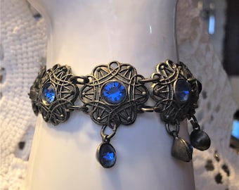 Stunning Vintage Metal filigree and Faceted Sapphire Blue Rhinestone Bracelet -