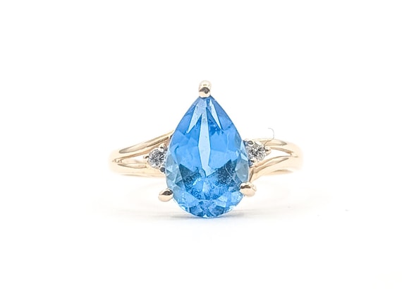 Composed Blue Topaz & Diamond Ring in 14k Yellow Gold