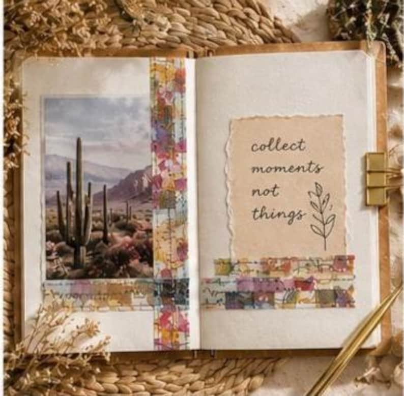 May include: An open journal featuring a photograph of a desert landscape with saguaro cacti on the left page and a tan paper insert on the right page with the text "collect moments not things" and a line drawing of a plant, decorated with patterned tape.