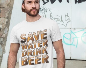 May include: A white short-sleeved crew neck t-shirt featuring the text "SAVE WATER DRINK BEER" printed in a bold, blocky font. Each letter is designed to look like a glass filled with amber-colored beer, complete with white foam.