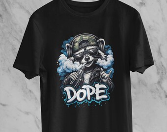 May include: Black t-shirt featuring a raccoon wearing sunglasses, a camouflage hat, and headphones. The raccoon is holding a vape pen and surrounded by blue vapor. The word "DOPE" is written in white and blue graffiti-style font.