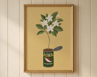 May include: A framed wall art print featuring a green Ligo sardines can with an open lid. A single thin stem grows out of the can, topped with a cluster of white flowers and green leaves. The background is a textured, solid mustard yellow color.