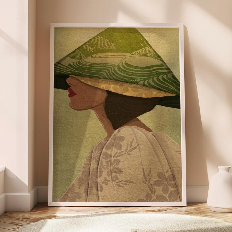 May include: Art print depicting a woman in a large, green and tan conical hat. She wears a cream-colored top with a floral pattern. The artwork has a vintage style and a soft colour palette.