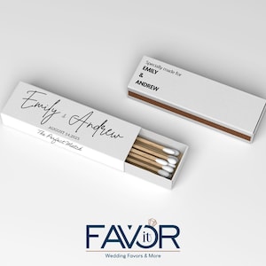 May include: White matchboxes with custom text for a wedding. One box is open, revealing wooden matches with white tips. The text on the box reads "Emily & Andrew, August 14, 2025, The Perfect Match."