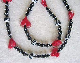 Necklace of Black and White Beads with Red Hearts / Furnace Clear Ecased Red Heart Beads / 32 Inches Long