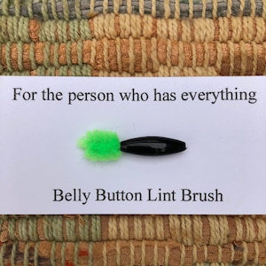 belly button lint brush - for the Person who has everything
