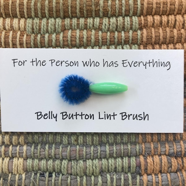 belly button lint brush - for the Person who has everything