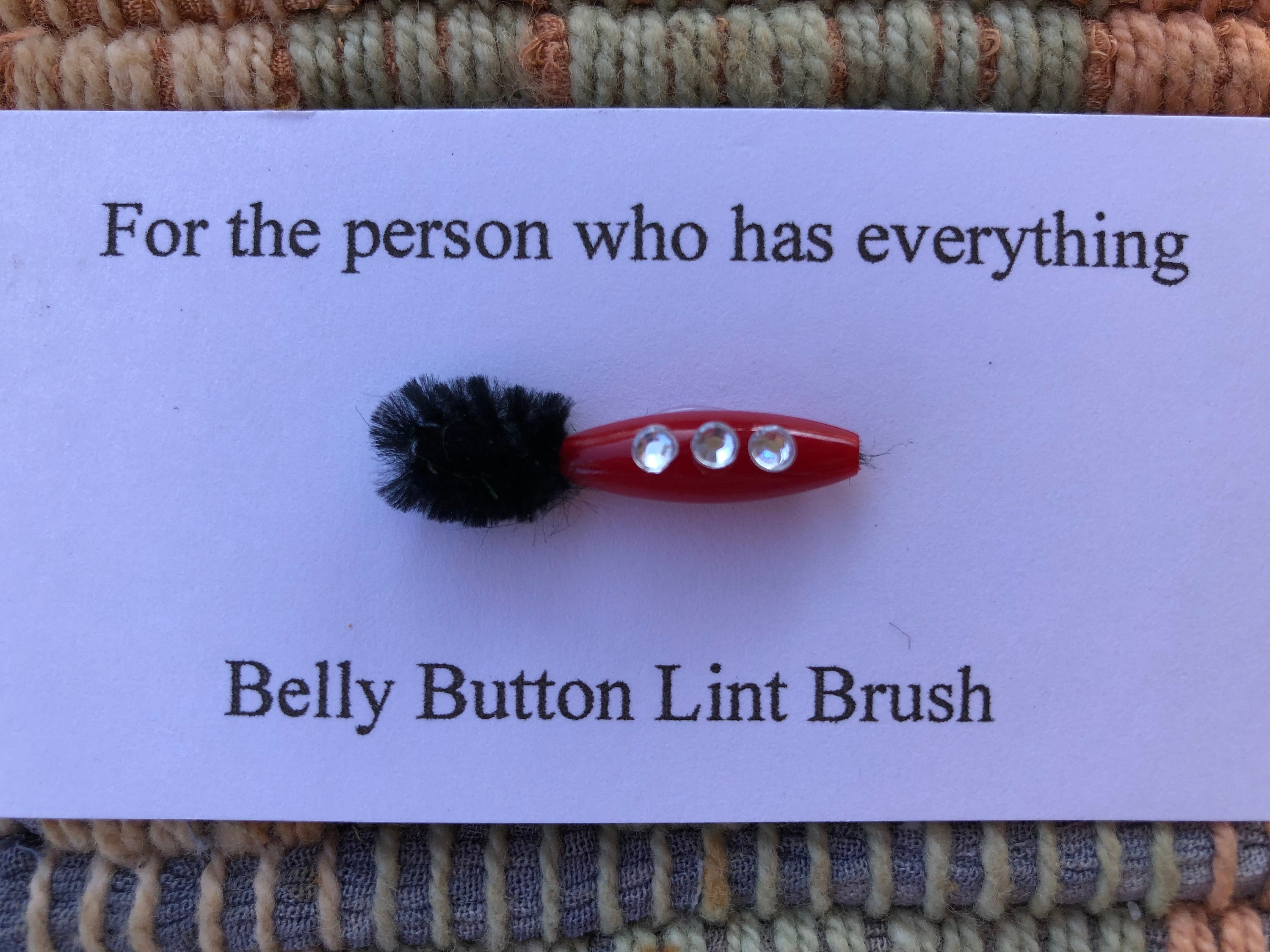 Jeweled Belly Button Lint Brush - for the person who has everything
