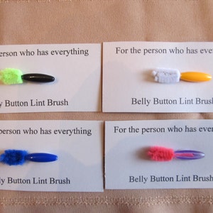 4 belly button lint brushes for the person who has everything image 2