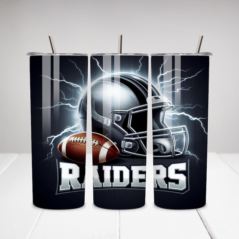 May include: Three black and silver stainless steel tumblers with a football helmet and football design. The tumblers have a white and black striped design and the text "RAIDERS" in silver lettering.