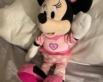 Minnie Mouse dolls.  Loved dolls looking for a new home. Minnie is clean and in great condition. Disney Minnie Mouse talking dolls.