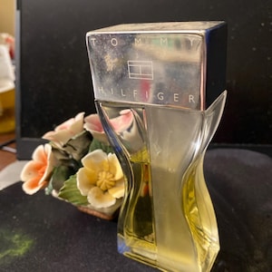 Tommy Hillfigure for her! 50 ml spray &gt; 3/4 full&gt; just not my flavor. A great deal on a Tommy cologne