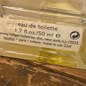 Tommy Hillfigure for her! 50 ml spray &gt; 3/4 full&gt; just not my flavor. A great deal on a Tommy cologne