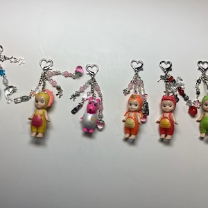 Sonny Angel Dinosaur Series Schlüsselanhänger | Kawaii Sammler Figur | Süßer Taschenanhänger Versiegelte Blind Box handgefertigt | Nicht offiziell