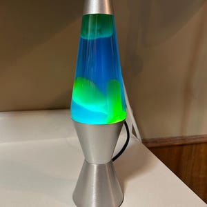 Retro Throwback Signature Classic Blue and Yellow Lava Motion Lamp Background Decor