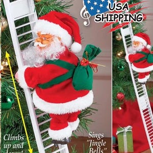 May include: Animated Santa Claus climbing a white ladder, wearing a red suit with white trim and a matching hat. He carries a green sack and sings "Jingle Bells." The text says "Climbs up and down!"