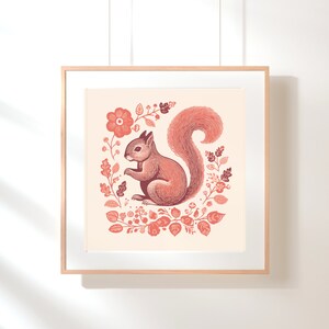 May include: A red squirrel sitting in a floral wreath with pink and red flowers and leaves. The squirrel is looking to the left and has a bushy tail.