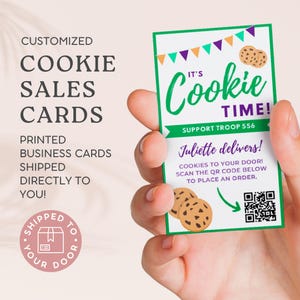 May include: Green and white business card with the text "It's Cookie Time!" and "Support Troop 556". The card also features a QR code and the text "Juliette delivers! Cookies to your door! Scan the QR code below to place an order."