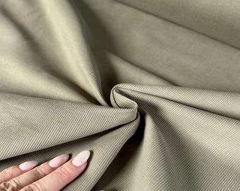Deadstock pale olive green corduroy fabric sold by the half yard | Structured tightly-woven medium-weight cotton corduroy