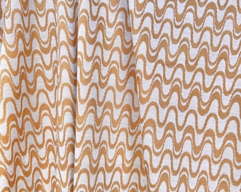 Deadstock Knit Fabric, sold by the 1/2 yard | Rust Caramel Swirly Groovy Pattern