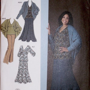 May include: Simplicity sewing pattern featuring the Khaliah Ali Collection. The image shows a woman wearing a blue skirt and top with a blue shawl. The pattern includes designs for a skirt, top, and pants. The size is FF 18W-24W.