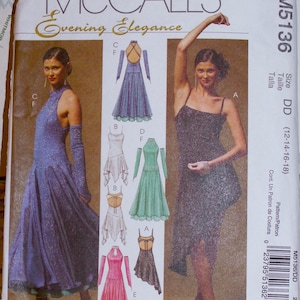 May include: McCall's Evening Elegance sewing pattern. The pattern includes illustrations of several evening gowns, such as a long blue dress with gloves and a black asymmetrical dress. The pattern number is M5136.
