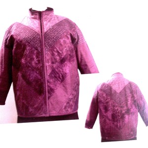 May include: A deep magenta quilted jacket featuring a high collar and a full-length front zipper. The garment displays a chevron-patterned texture across the chest and sleeves, with a consistent dark purple hue throughout the entire piece.