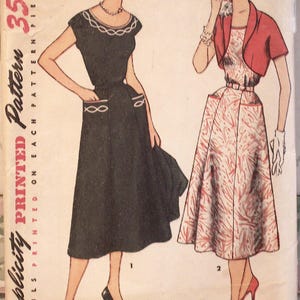 May include: Vintage Simplicity sewing pattern featuring two dress designs. The illustrations depict a black dress with white trim and a patterned dress with a red bolero jacket. The pattern is size 16, bust 34, and priced at 35 cents.