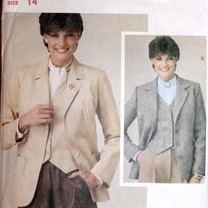 May include: Butterick pattern for a classic jacket and vest, size 14. The image shows a woman wearing a beige jacket and vest, and a gray jacket and vest. The text on the pattern reads "DUAL CONSTRUCTION Classic jacket and vest."