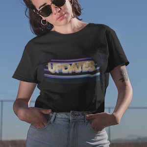 Women&#39;s High-Waisted T-Shirt Featuring “Updates” from Unsolved Mysteries