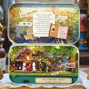 Countryside Notes Liten plåtscen – Kaniner i en trädgård DIY miniatyrplåtsats – Kreativt pysselset med LED