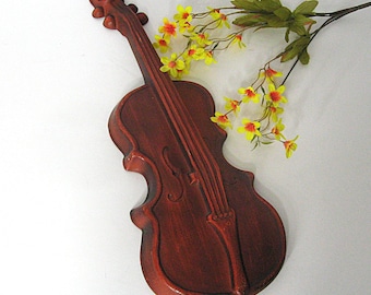 Placa de pared vintage de violín de los años 60, aluminio fundido Royal, color naranja quemado, 45 cm de largo, arte de pared de mediados de siglo.