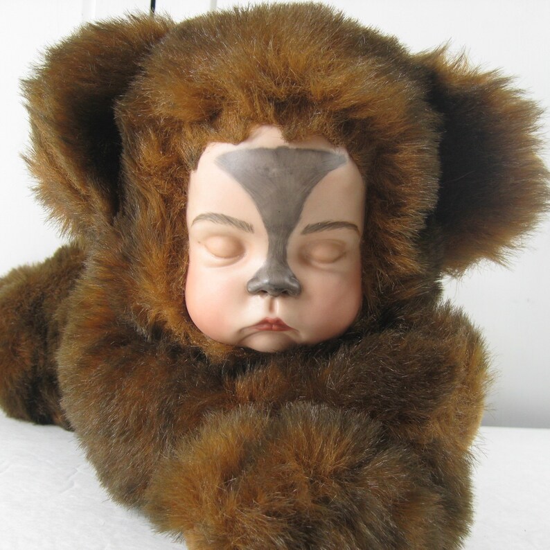 teddy bear with porcelain face