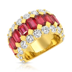 May include: A gold band ring with a row of red emerald-cut gemstones surrounded by round white gemstones.