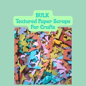 May include: A collection of colorful, textured paper scraps in various shapes and sizes. The scraps are in shades of red, orange, yellow, green, blue, and purple. Text on the image reads: "BULK Textured Paper Scraps For Crafts."