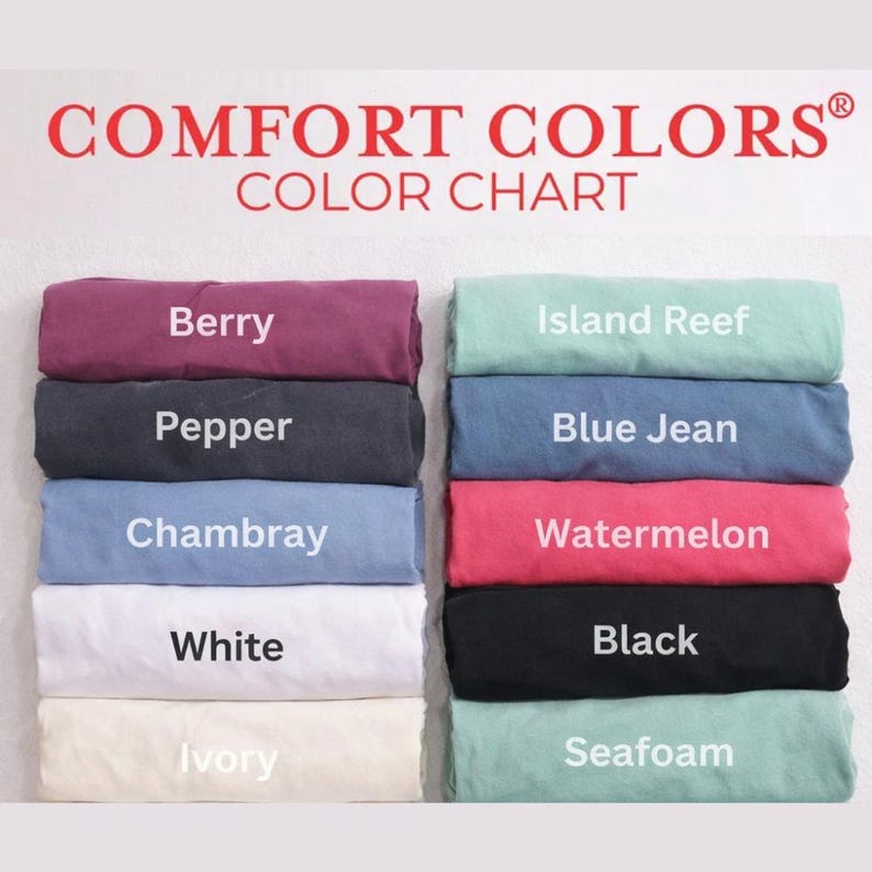 May include: A color chart titled "COMFORT COLORS" displays folded fabric samples in various hues. Colors include Berry, Pepper, Chambray, White, Ivory, Island Reef, Blue Jean, Watermelon, Black, and Seafoam. The chart is designed to showcase the available color options.
