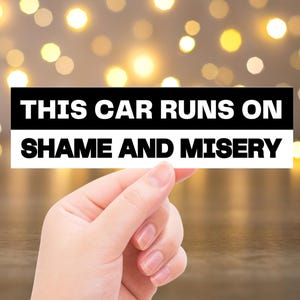 Funny Bumper Sticker – This Car Runs on Shame and Misery, Sarcastic Vinyl Decal, Dark Humor Car Accessory, Pessimistic Joke Car Sticker