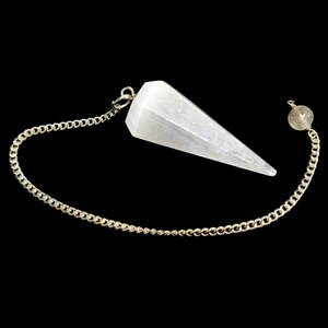 May include: White selenite crystal pendulum with a silver chain and a clear crystal bead at the end.