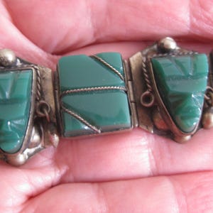 Mexico silver 925 stamped bracelet with 9 green Onyx stones, 7&quot; hinged bracelet with slide lock. 1 green Onyx stone is missing. See listing