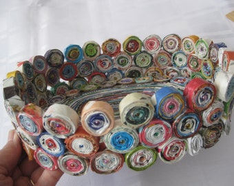 Upcycled handmade paper bowl/basket . Rolled up magazine pages, colorful. Jewlry dish, fruit bowl, any other decorative use. 9" x 8" x 2.5".