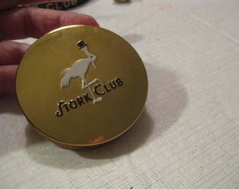 Stork Club NYC memorabilia - compact powder case with original powder still intact, gold tone case. Great collection addition.