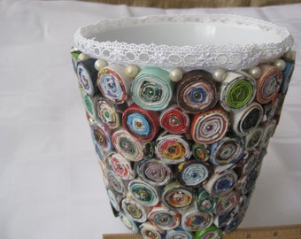 Upcycled container/planter. Rolled up magazine pages on a plastic container, colorful. Vase, planter, centerpiece, home decor. 6.5"x 6"