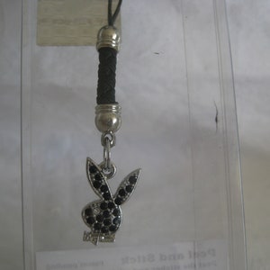 Playboy phone strap/keychain, bunny head with black rhinestones, remove and use as pendant, charm, make earrings. last 2. Free shipping.
