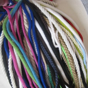 Rope handles from shopping bags, to re-use, repurpose, craft supply, fiber art, multimedia craft, over 80 pcs. dif. colors and lengths.