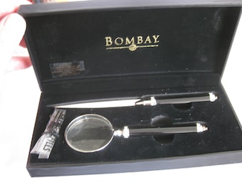 A vintage desk set of letter opener and magnifier/pen, by Bombay, in a velvet lined box. New, never used. To keep or to gift.