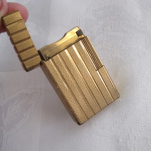 S.T. Dupont de Paris, vintage lighter, made in France, # E2E379, gold plated.