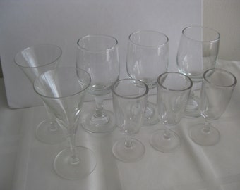 Classic shapes mid. century liquor glasses, mismatched, clear glass set of 8. Vintage