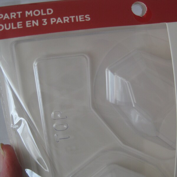 Heart shaped mold, for Valentine's day. A 3 part plastic mold to make a chocolate heart and fill up with sweets.