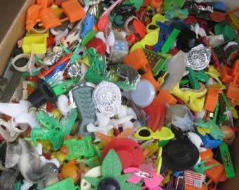 Mystery trinkets grab bag, 3 oz. over 60 pcs. Crafting, multimedia art, collage, other use. (Not for kids under 3 ys. old)