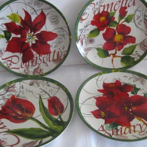 4 Red flowers plates, ceramic, 8", by Julie Ueland, Certified International. pre-owned in perfect condition. Christmas colors.